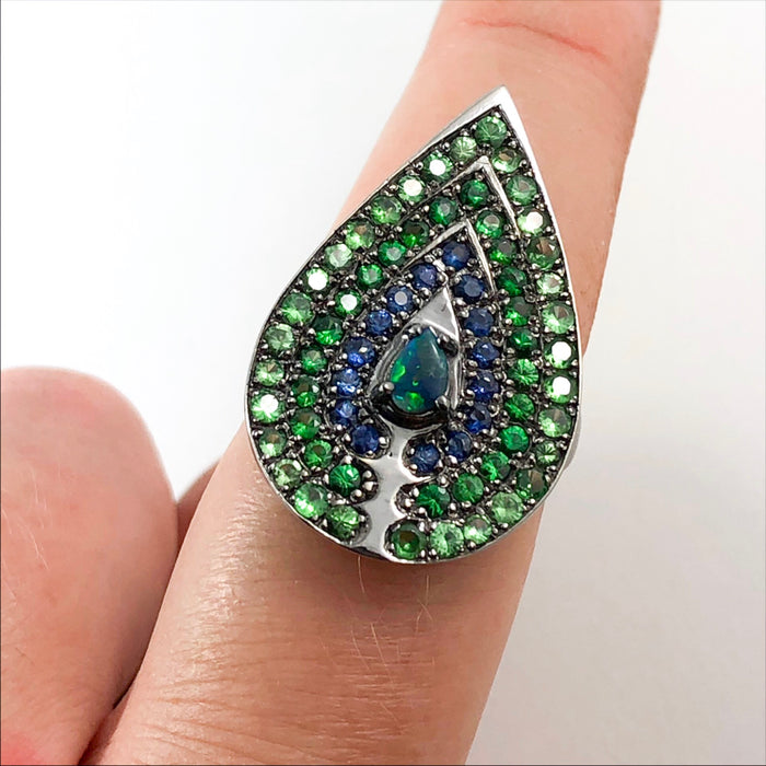 Opal tsavorite garnet blue and green sapphire black gold peacock statement ring