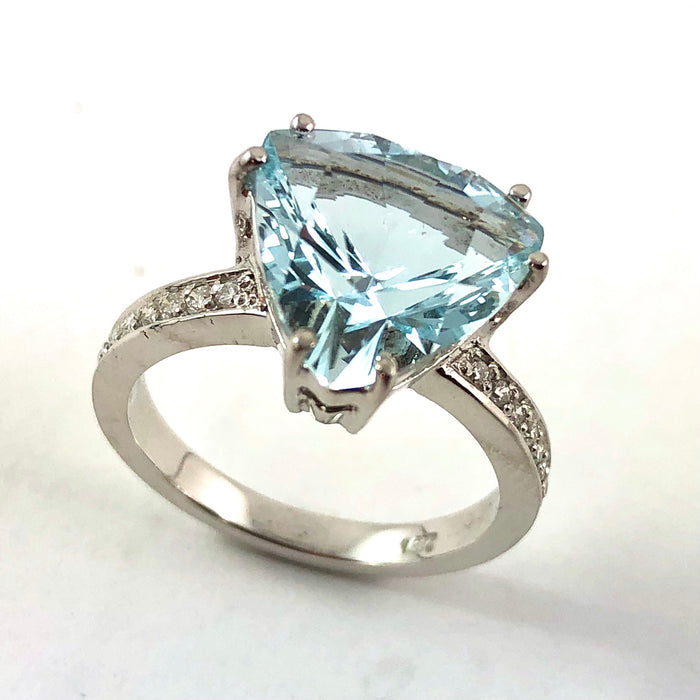 Natural untreated blue topaz trillion white gold and diamond ring