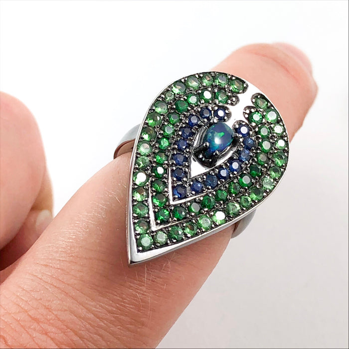 Opal tsavorite garnet blue and green sapphire black gold peacock statement ring
