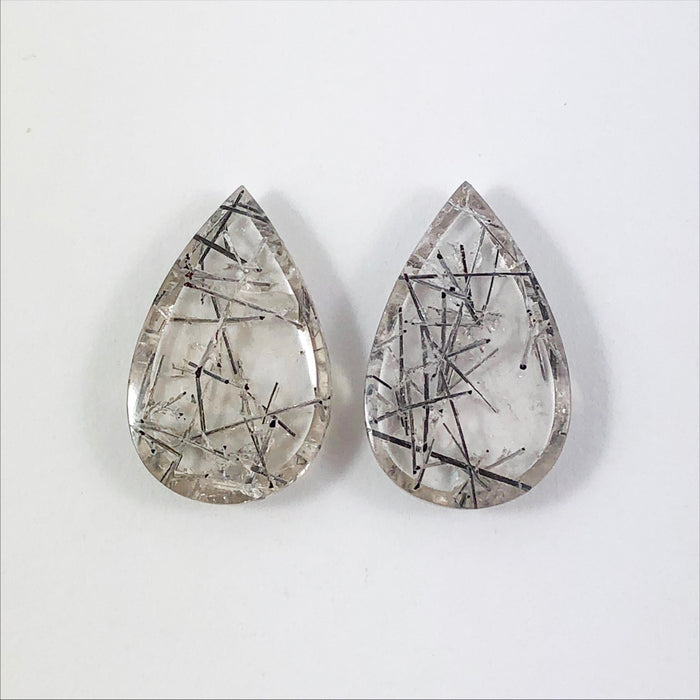 Tourmalated rock quartz pear cut matched cabochon pair 21.44 carats total - Buy loose or customise